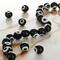 12 Pack: Lampwork Glass Round Evil Eye Beads, 8mm by Bead Landing™
